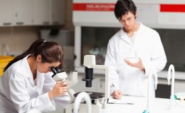 Young science students making experiments